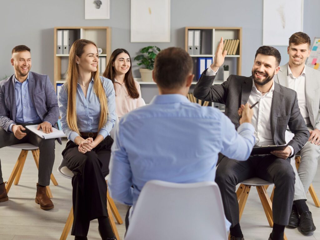 Engineer leading a team meeting with confidence and clarity.