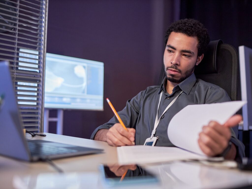 Engineer analyzing performance data and tracking project results.